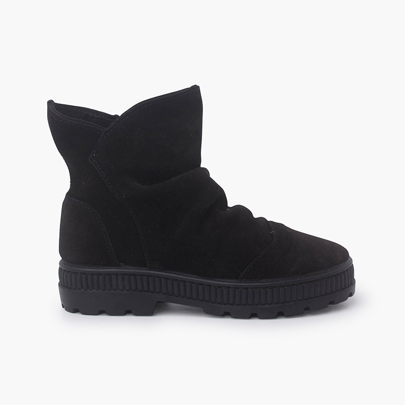 Bottes en suède à effet froissé Noir